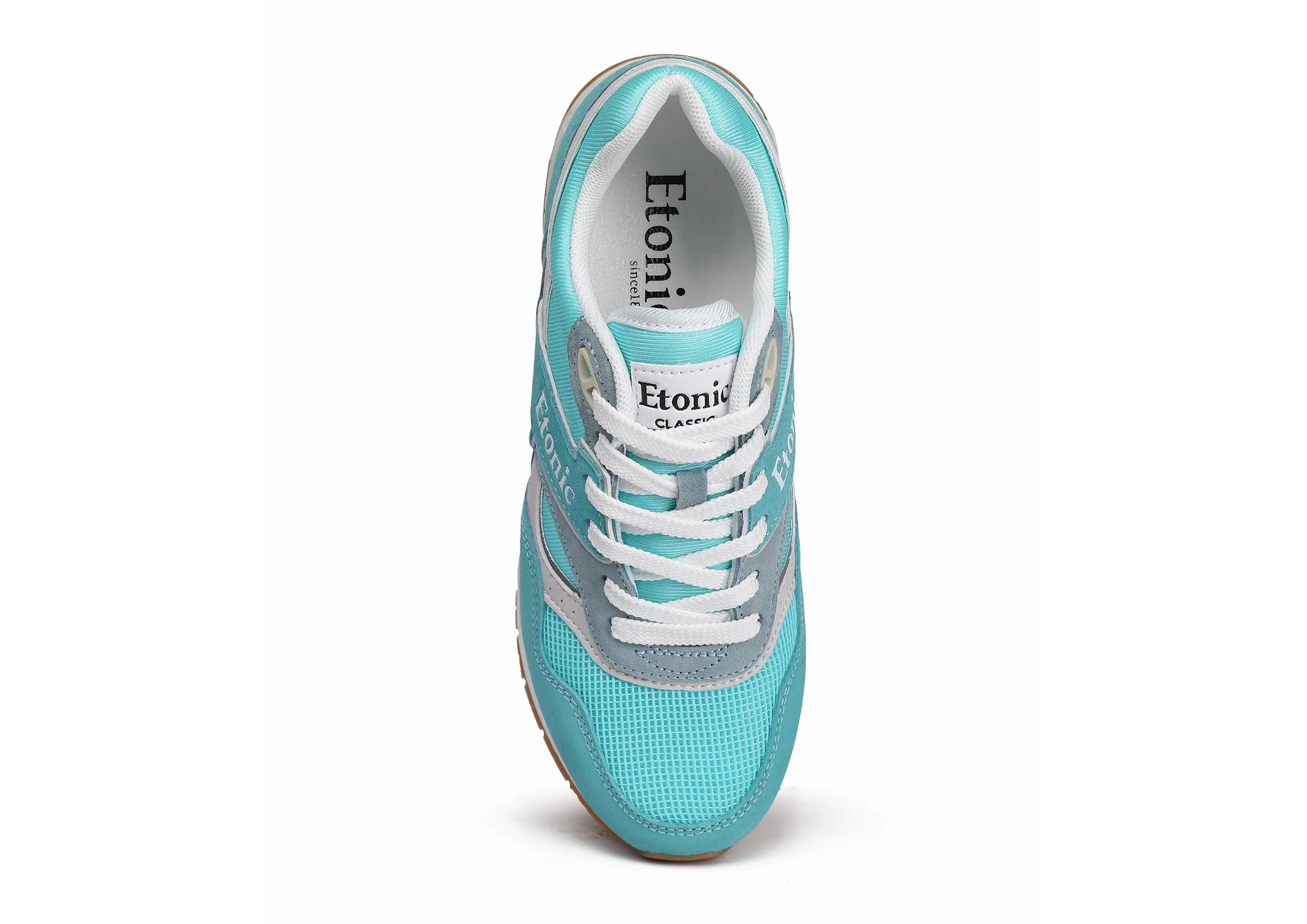 Etonic Stable Base sneakers in turquoise mesh fabric, turquoise suede with multi-layer powder blue leather inserts, off white midsole and light honey bottom outsole.