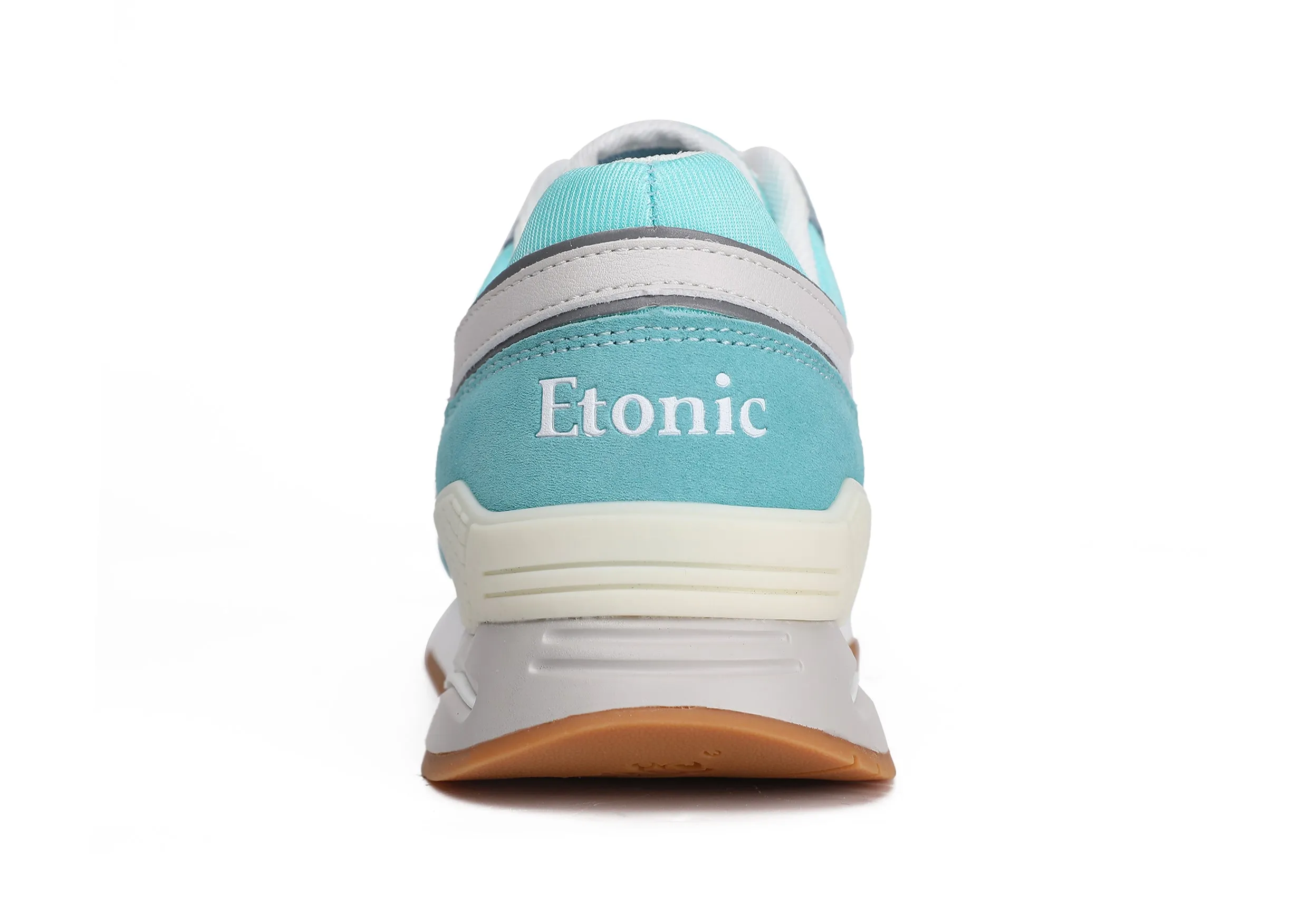 Etonic Stable Base sneakers in turquoise mesh fabric, turquoise suede with multi-layer powder blue leather inserts, off white midsole and light honey bottom outsole.